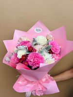 Petal Dream bouquet with pink and white carnations, white roses, and burgundy chrysanthemums wrapped in pink paper with matching ribbon